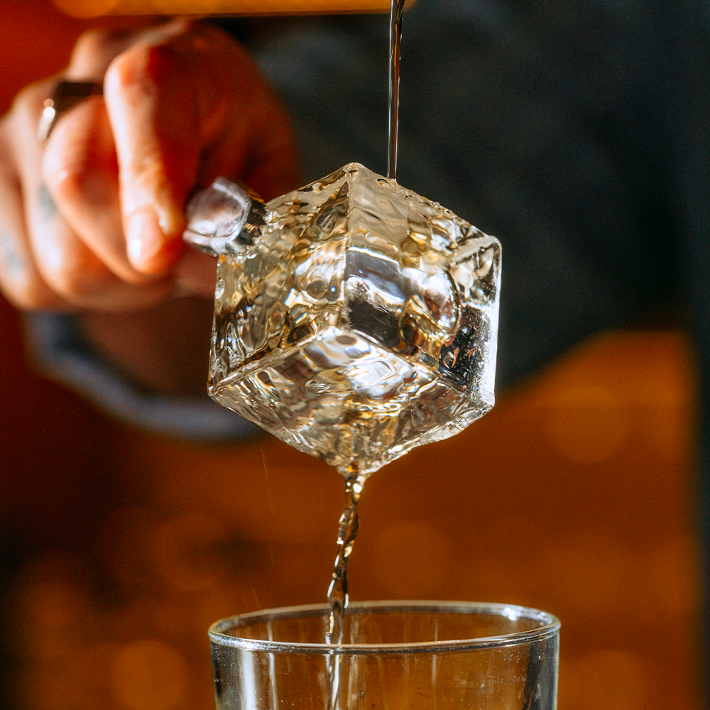 The Molecular Supremacy of the Crystal Clear Ice Cube